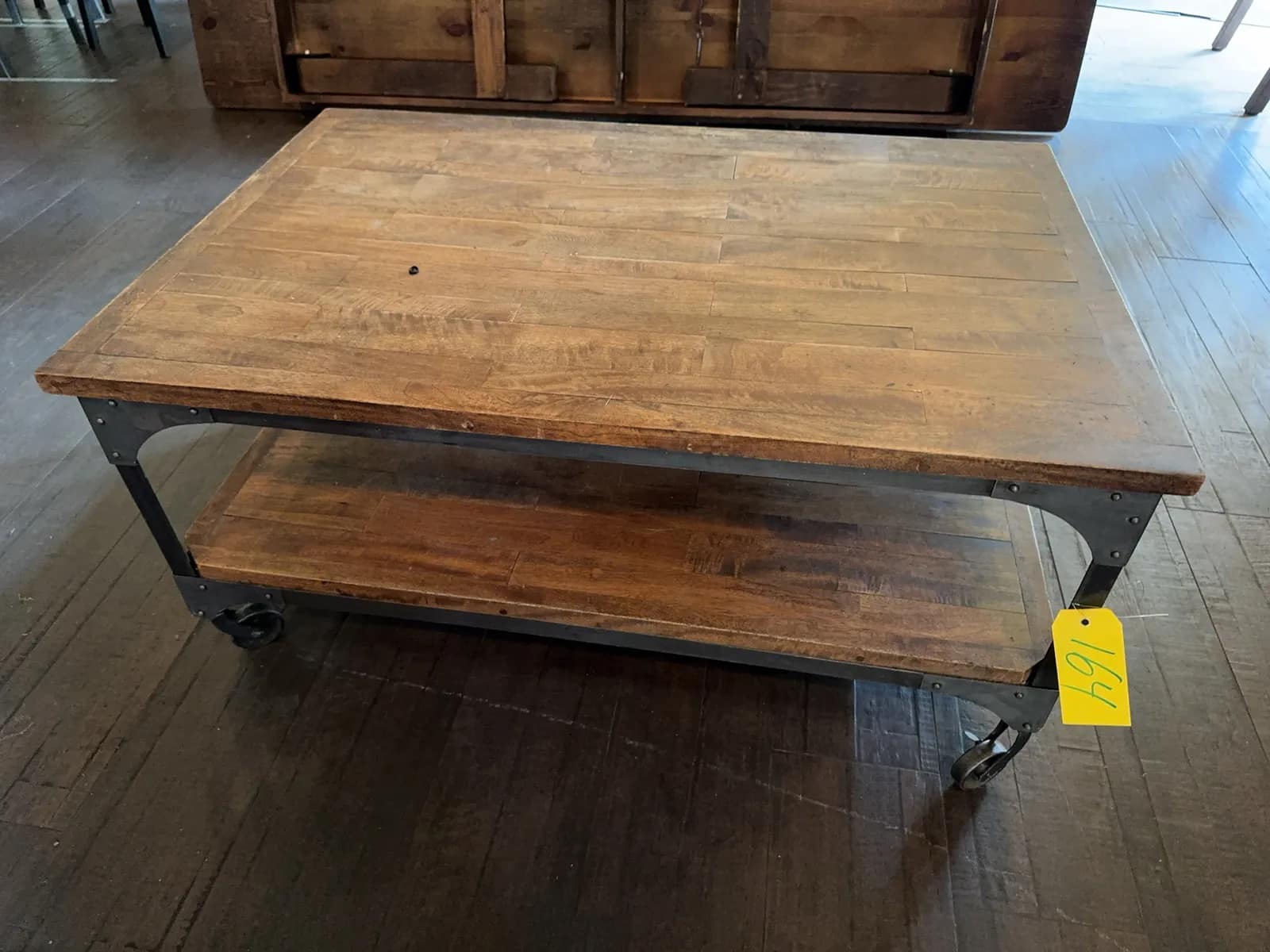 rolling-wood-and-steel-coffee-table-0b3b09