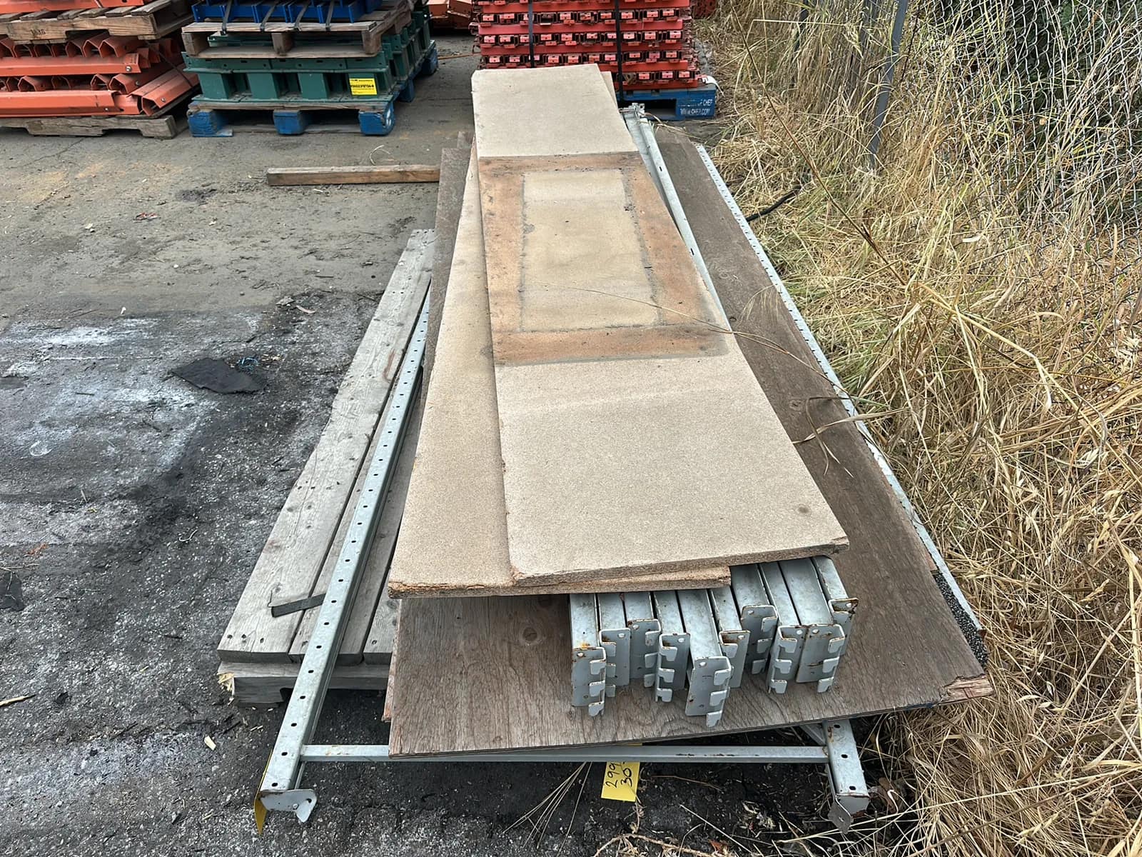 Contents Of Pallet: (2) 8’ Uprights, (5) 20.5”x107.5” Plywood Shelves, And (10) 8’ Crossmembers, photo 4 of 5