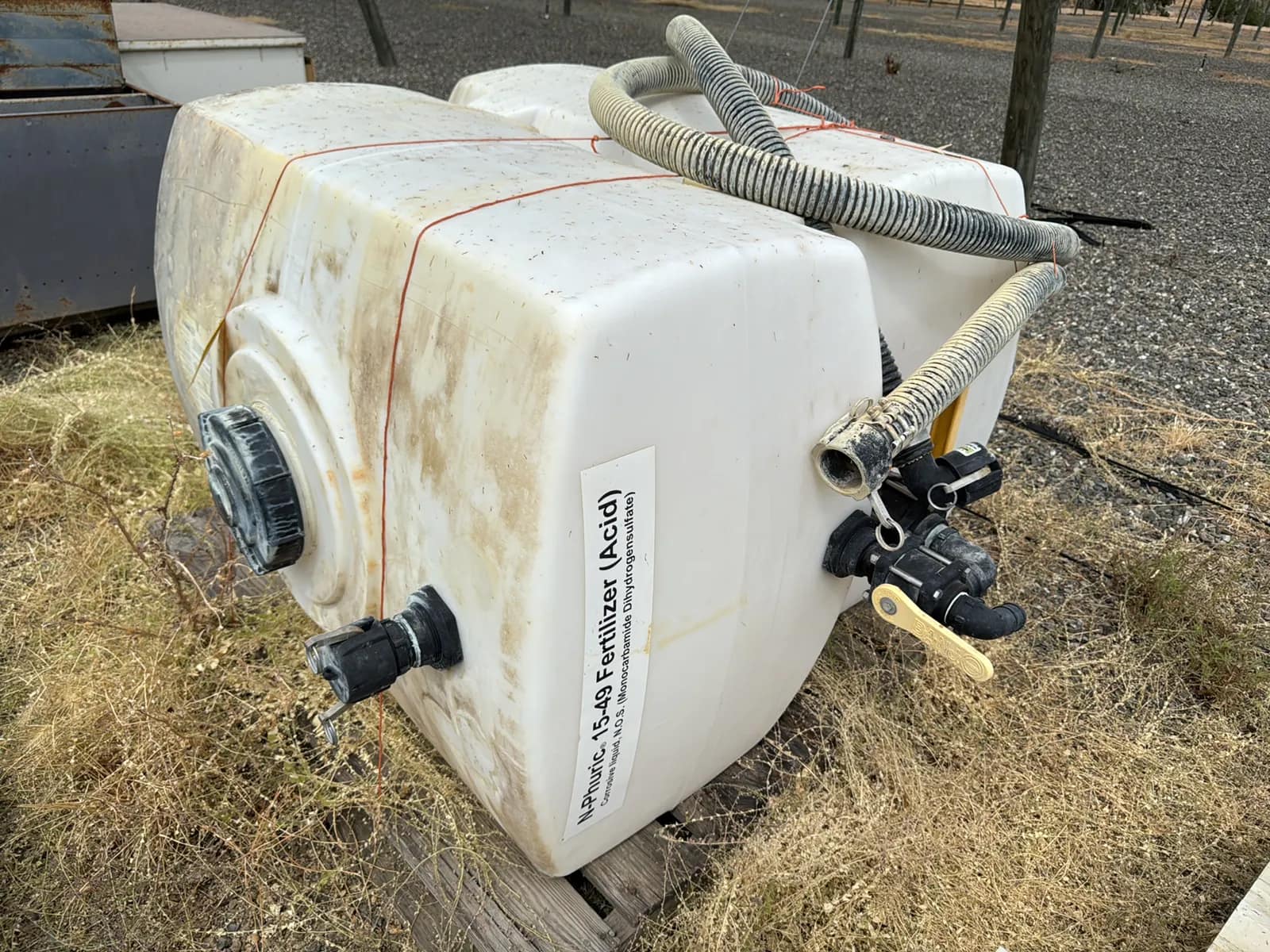 contents-of-pallet-2-150-gallon-fertilizer-tanks-with-hose-attachments-and-more-d18be7