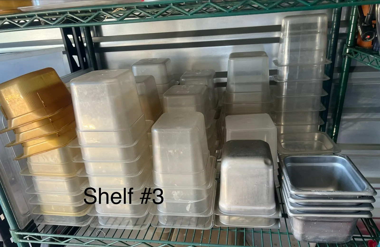 assorted-plastic-and-metal-food-storage-containers-shelf-3-d21257