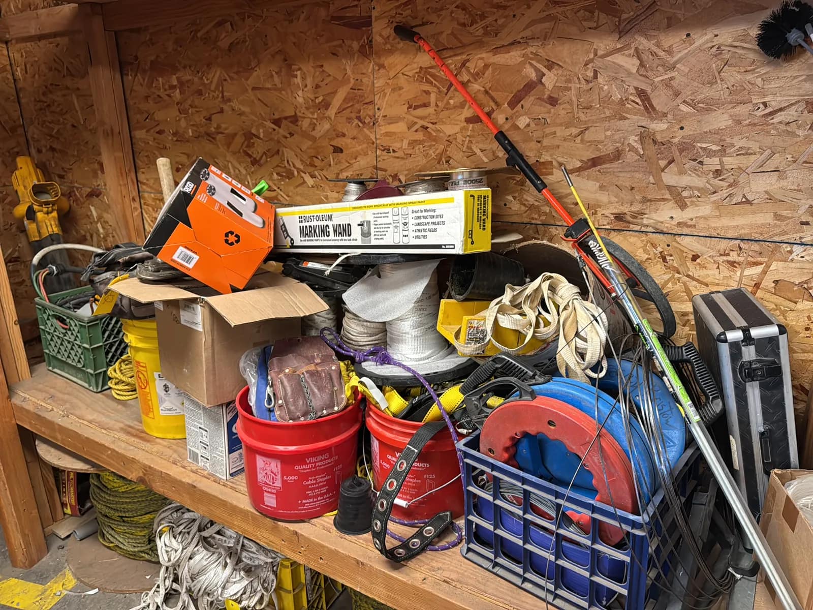 contents-of-shelf-power-cables-strapping-hand-tools-and-buckets-52f825