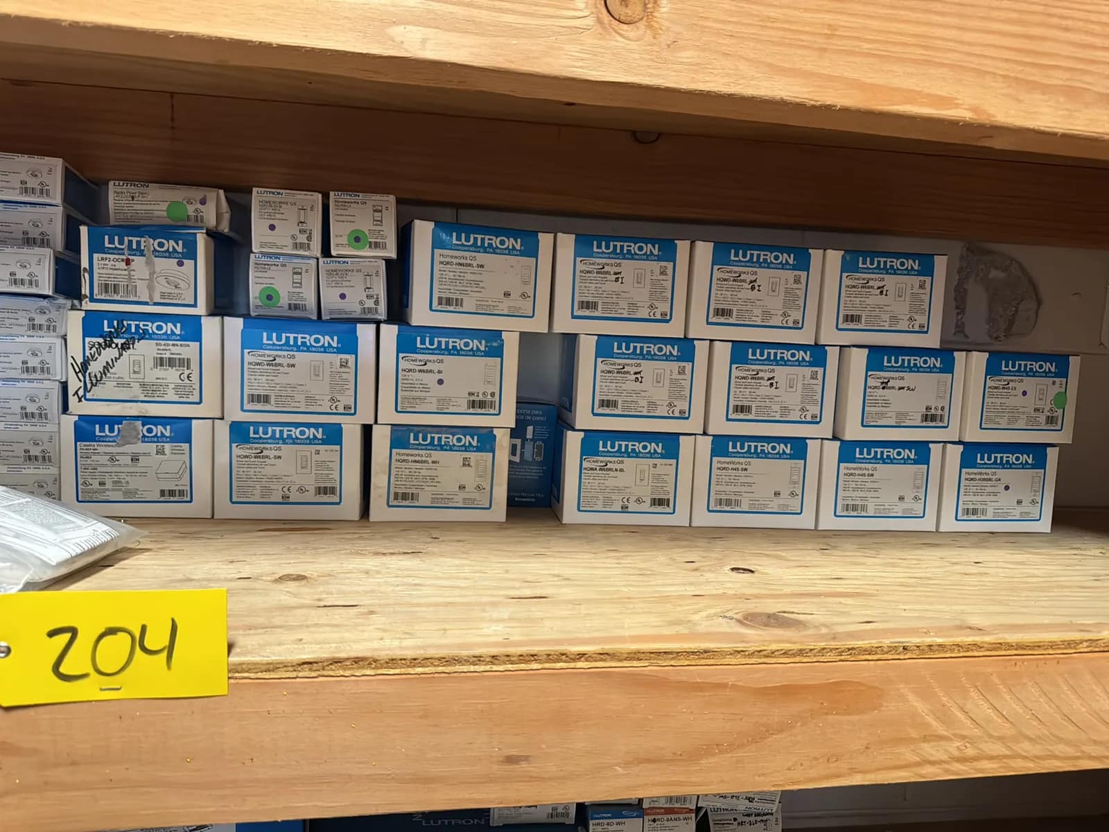 contents-of-1-shelf-lutron-accessories-touch-keypad-radio-power-saver-power-modules-and-more-mu94zpbk