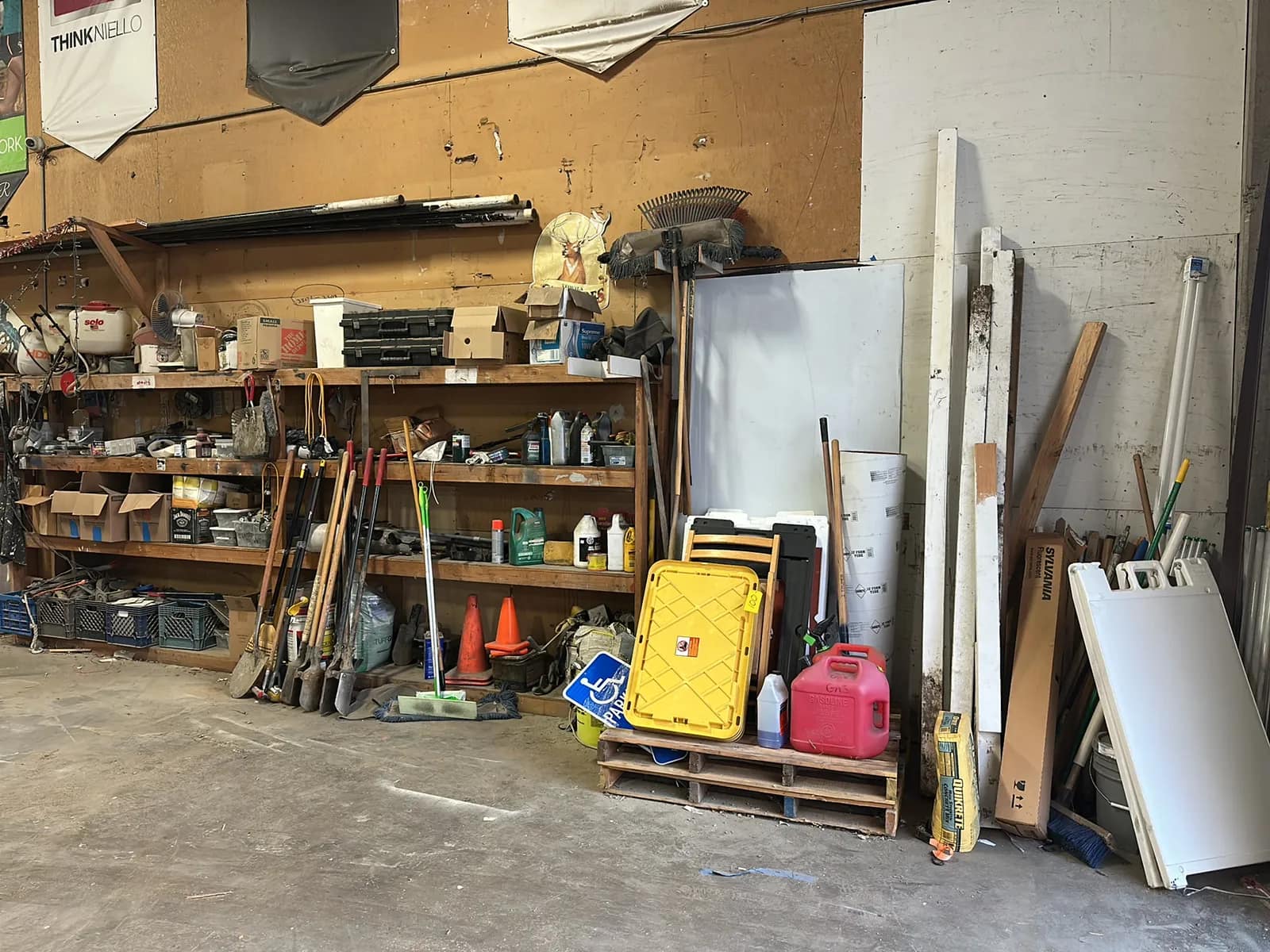 contents-of-wall-gas-cans-fluorescent-light-bulbs-hole-diggers-heavy-duty-casters-and-more-285f2d