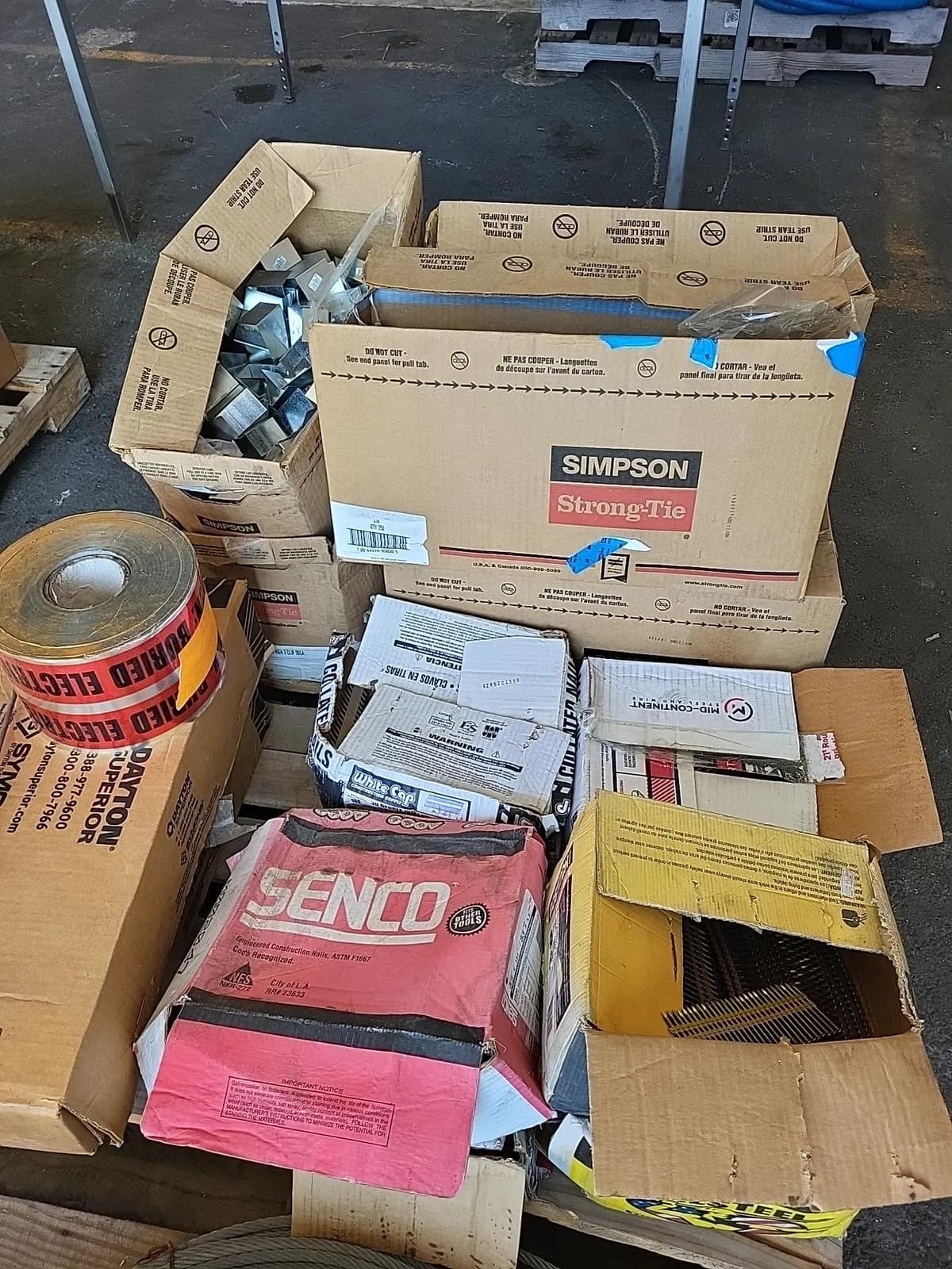pallet-of-various-nails-and-hardware-mu4rp9xh