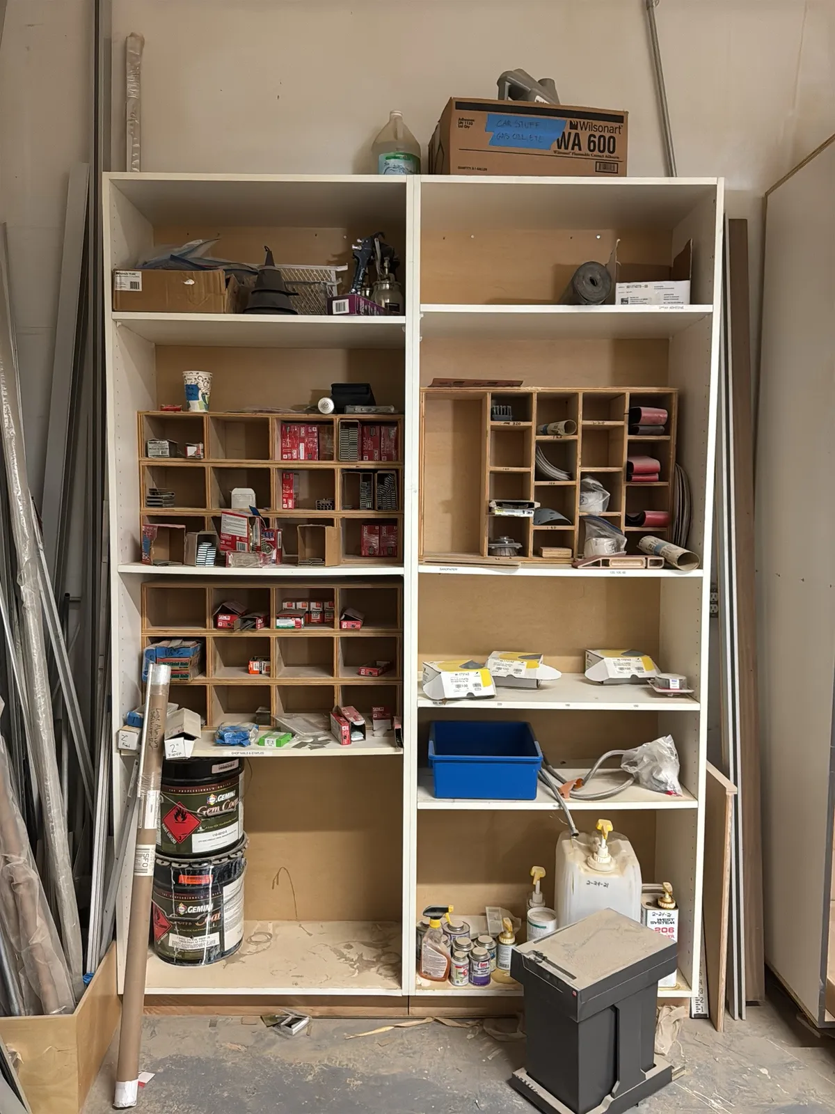 cabinet-and-contents-finish-staples-brad-nails-sandpaper-and-spray-guns-mug5c0uc
