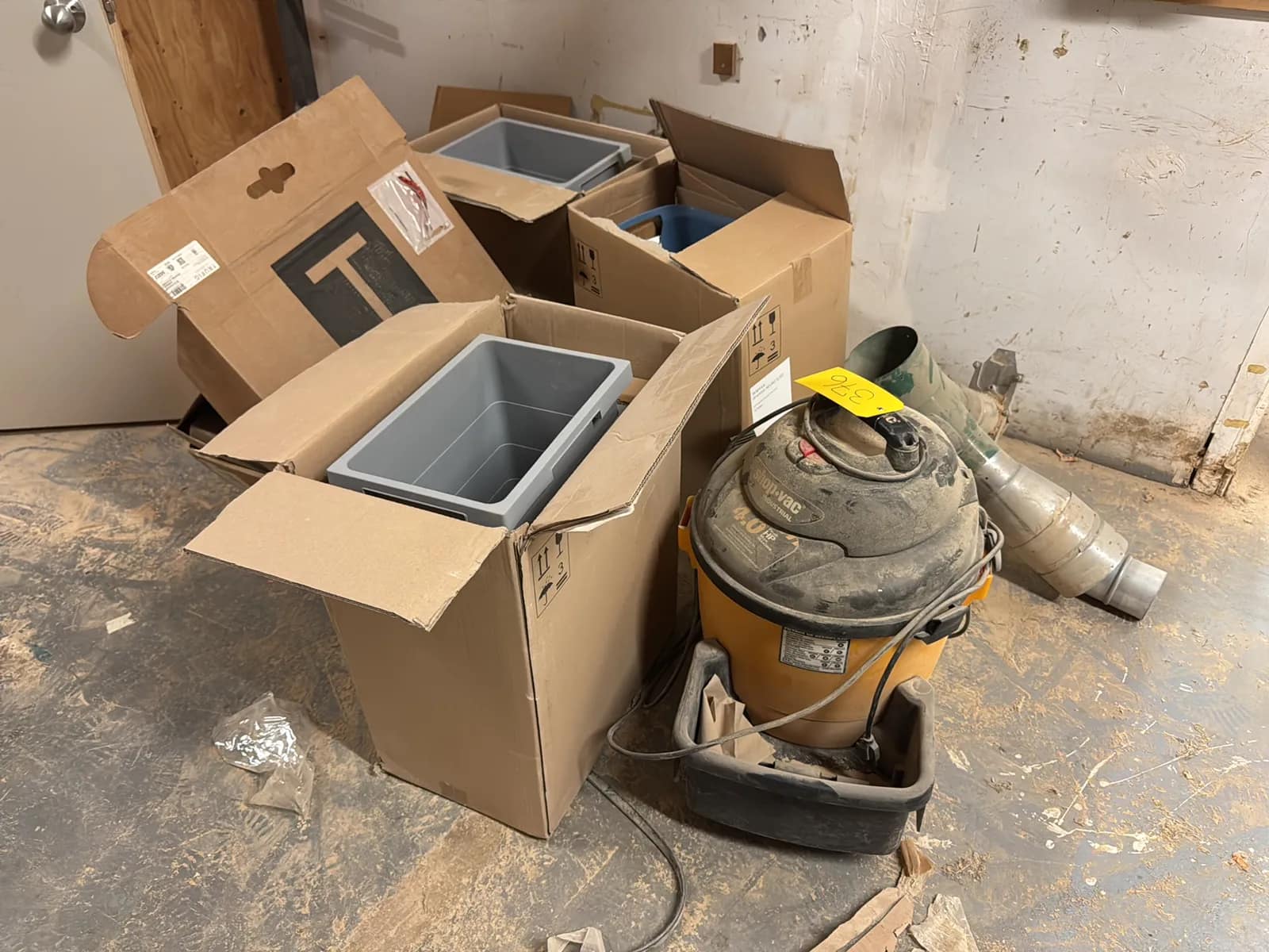 contents-of-corner-vacuum-garbage-cans-hazard-cones-and-more-72217a
