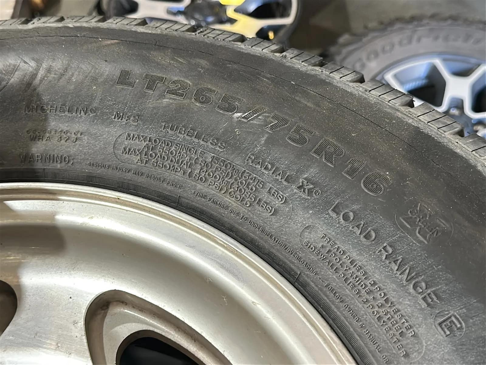 (4) Michelin LT265/75R16 Tires With Ford Hubcaps, photo 4 of 5