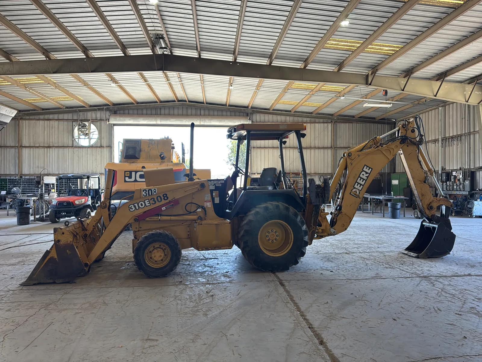 John Deere 310E Backhoe Loader, photo 2 of 7
