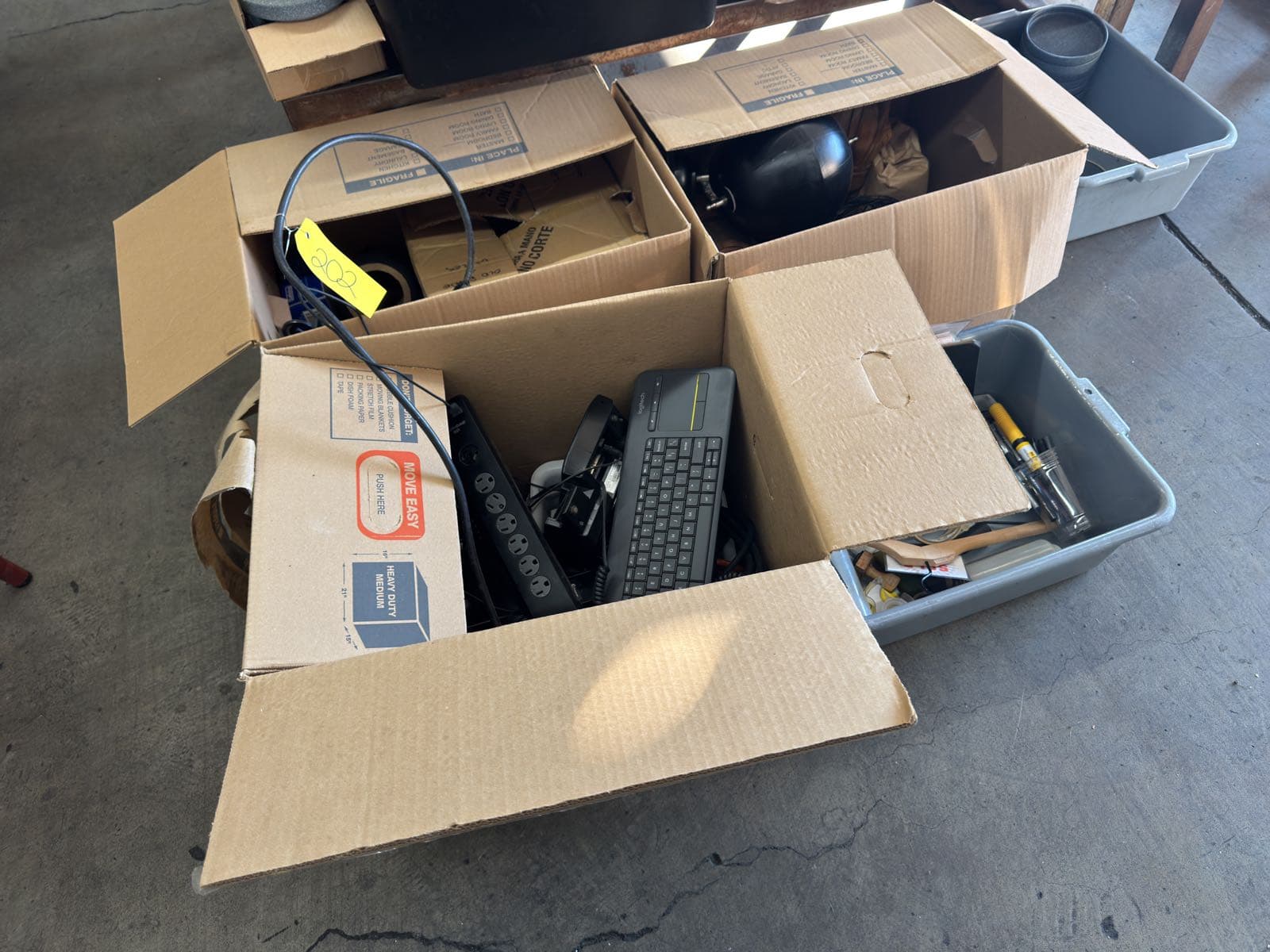 3-boxes-of-office-supplies-keyboards-phones-and-decor-b9b234