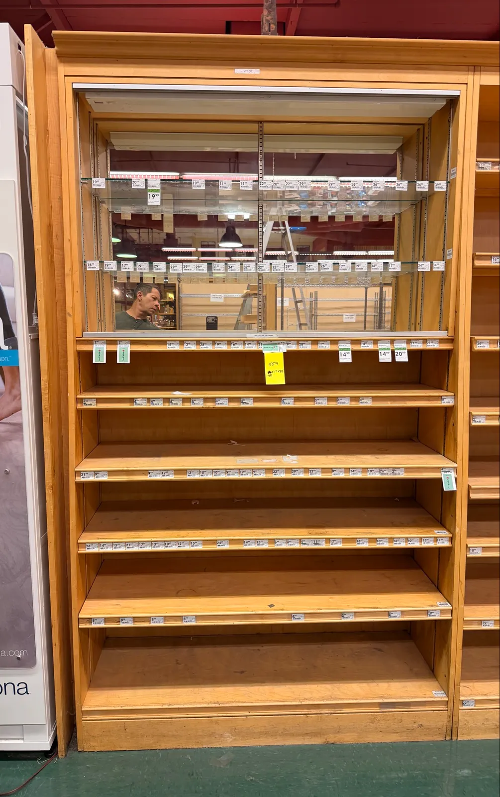 wooden-fixture-with-shelves-and-mirror-5fcd68