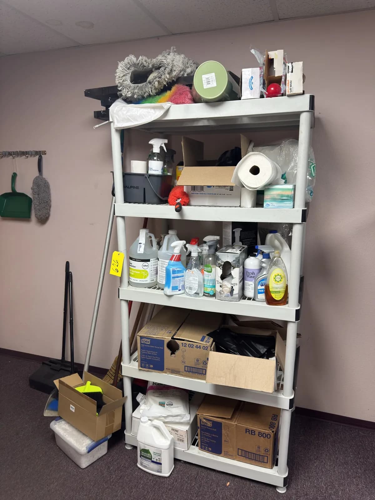 rack-and-contents-cleaning-supplies-trash-bags-bulbs-and-wooden-boards-c9536c