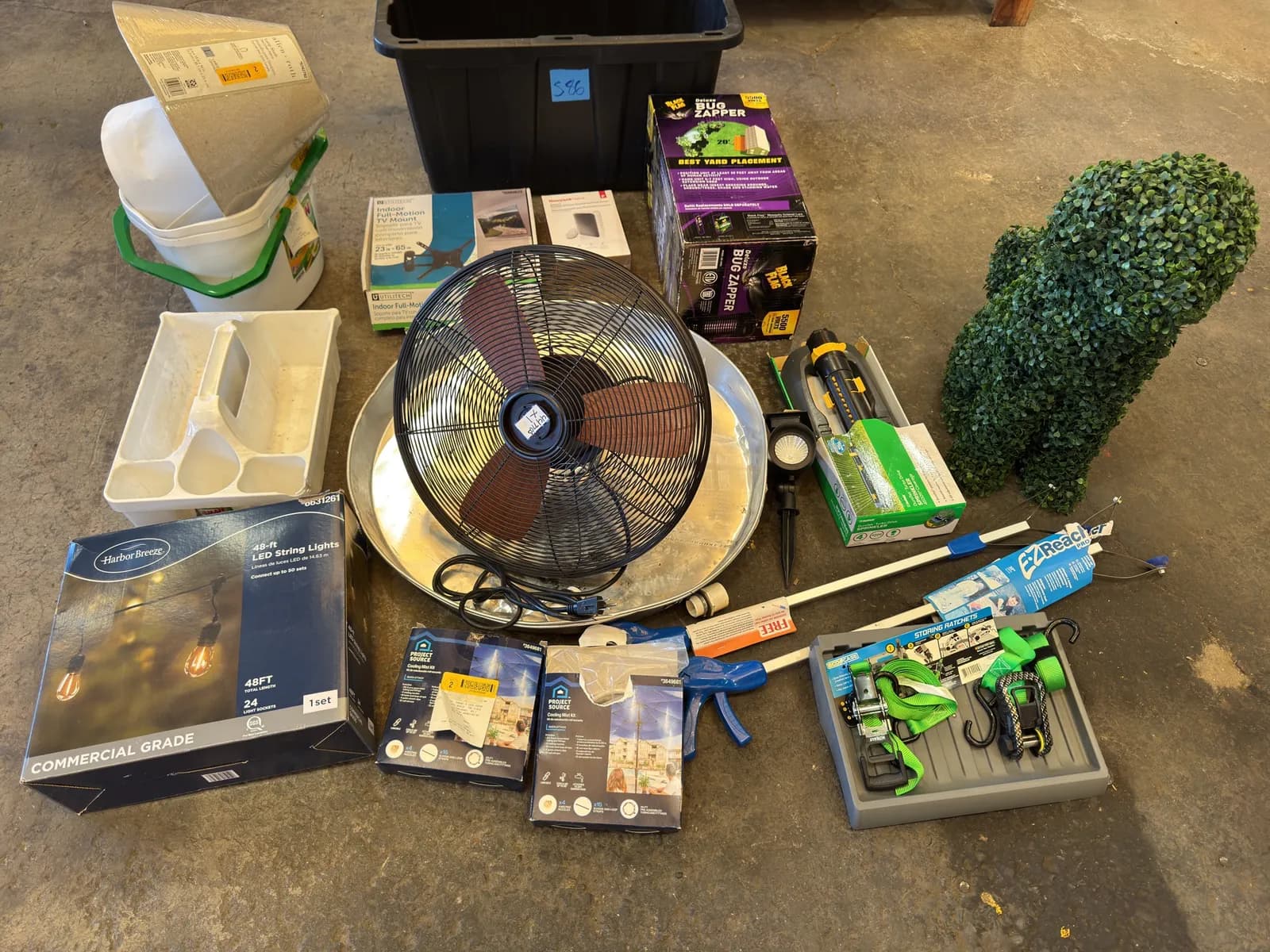 contents-of-bin-assorted-houseware-wireless-doorbell-bug-zapper-patio-fan-and-more-mm2loqe0