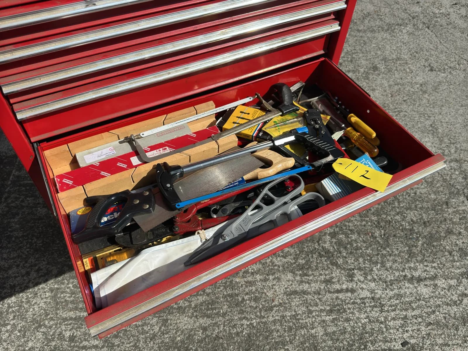 contents-of-drawer-assorted-handsaws-tin-shears-bolt-cutters-and-more-f1c367