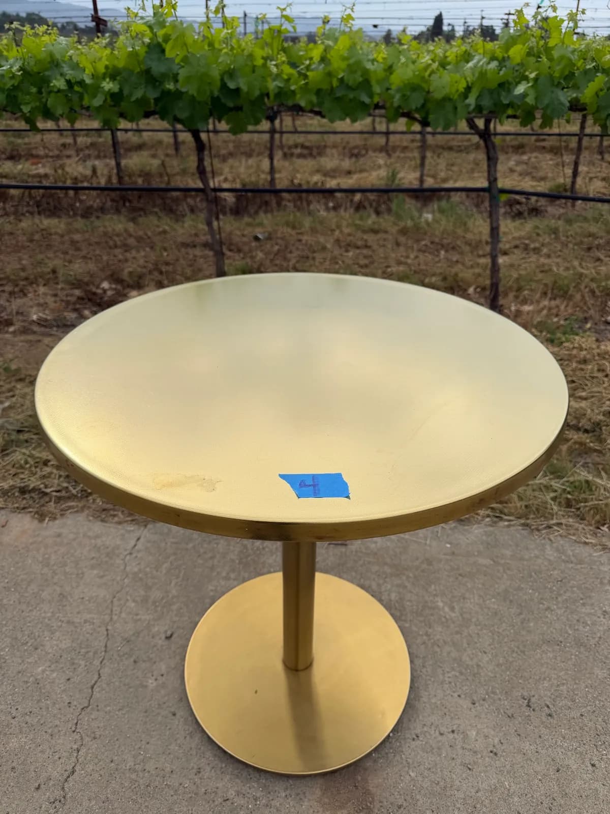 crate-and-barrel-gold-metal-round-table-with-pedestal-base-0502-1774991359566-mnf40yfi