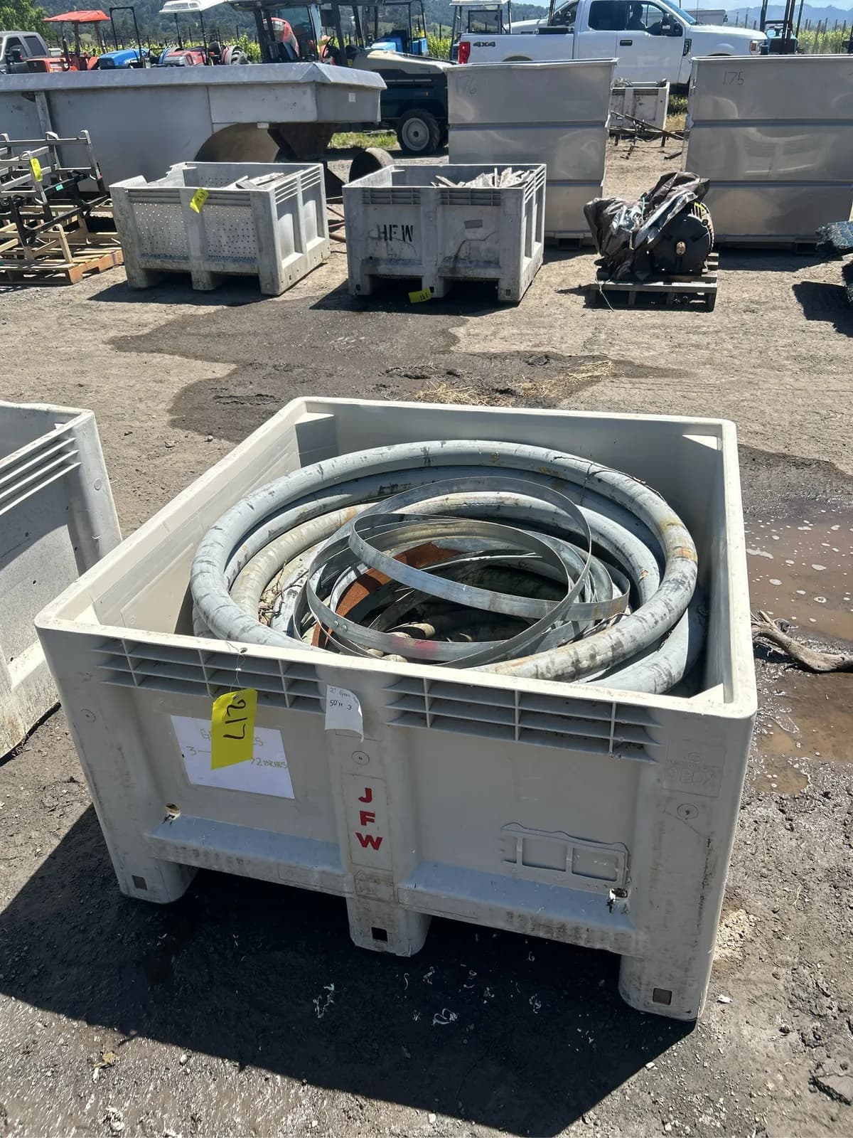 1-2-ton-bin-with-water-hose-eea5e1