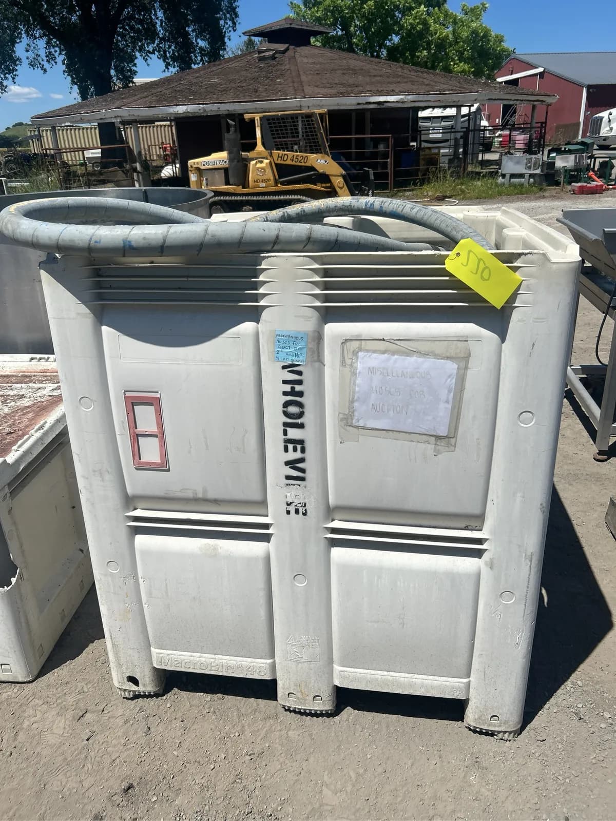 1-ton-bin-with-miscellaneous-water-hose-f714c9