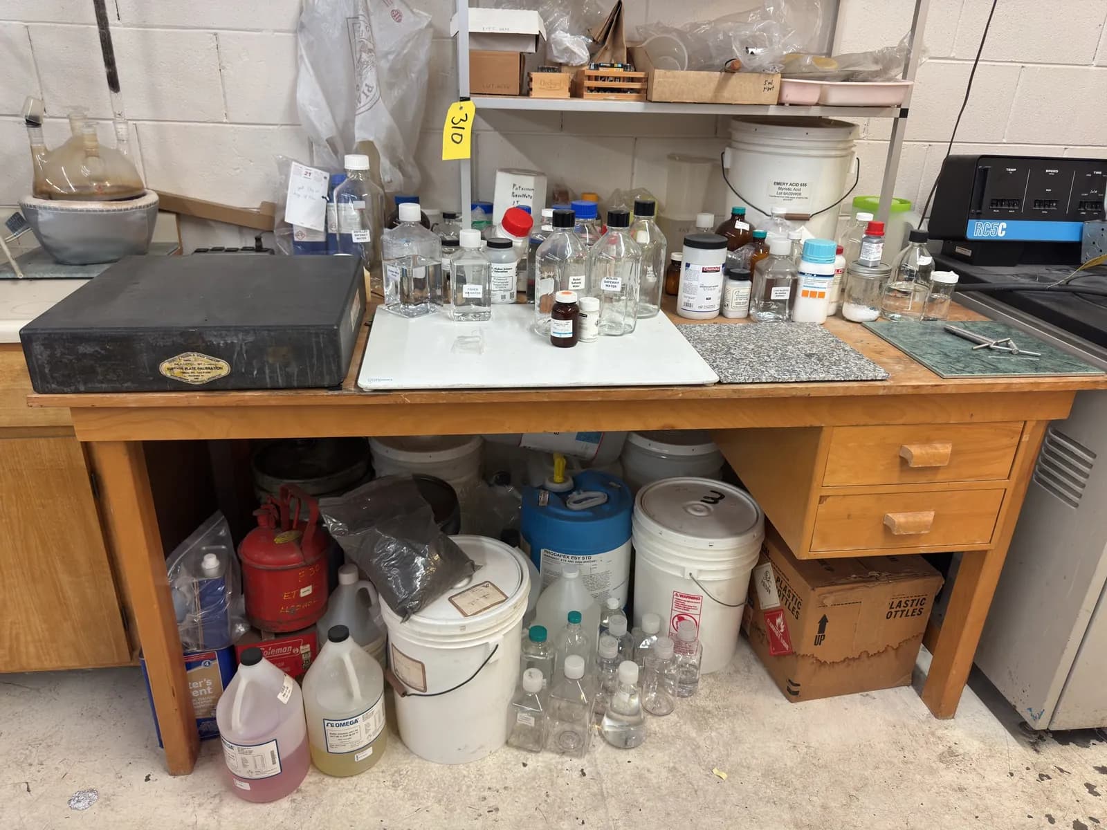 wood-desk-with-contents-calibration-stone-glassware-and-more-chemicals-not-included-mphbhft2