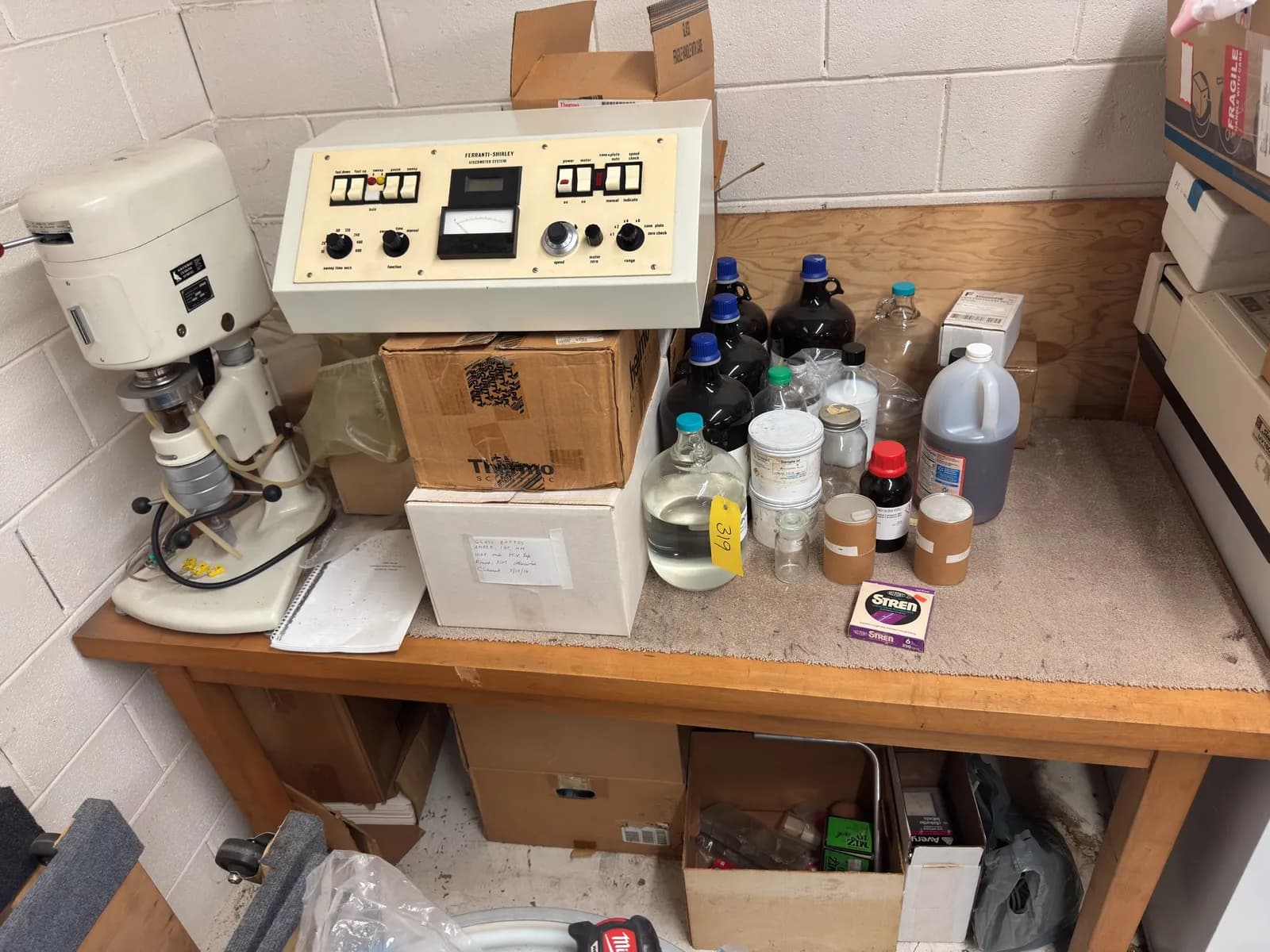 wood-desk-with-contents-ravenfield-viscometer-ferranti-shirley-viscometer-and-more-chemicals-not-included-mphbi9cv