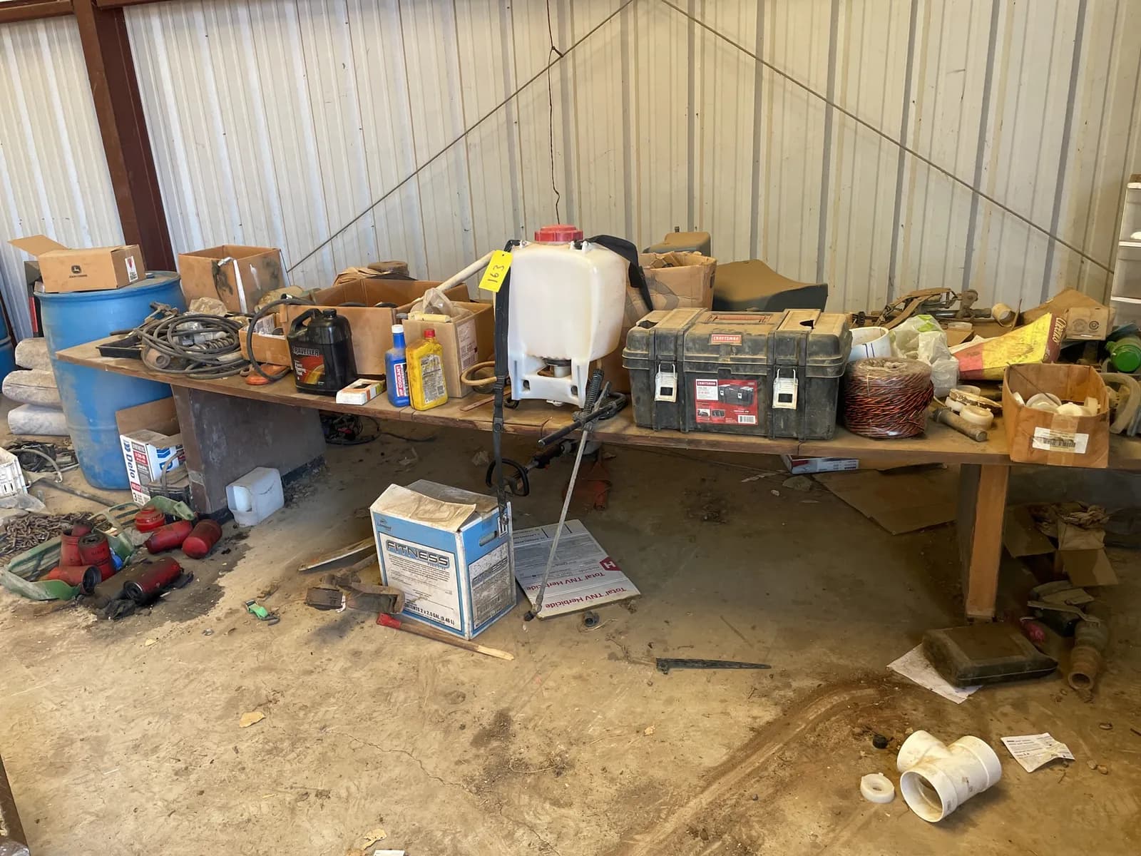 table-with-contents-plastic-drum-barrel-craftsman-tool-box-backpack-sprayer-and-more-mppy9u56