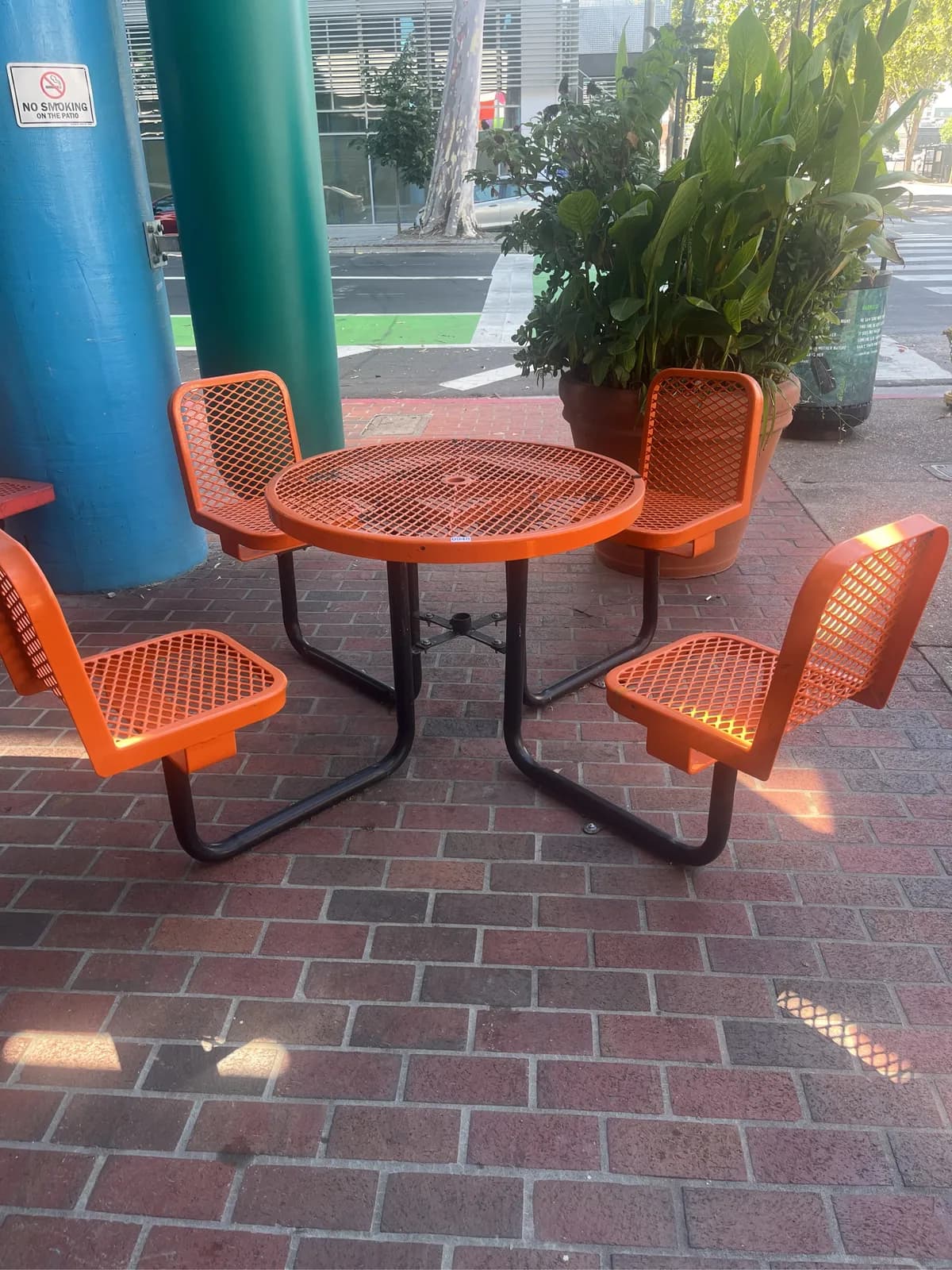 orange-metal-picnic-table-with-four-matching-chairs-mpmra5q4
