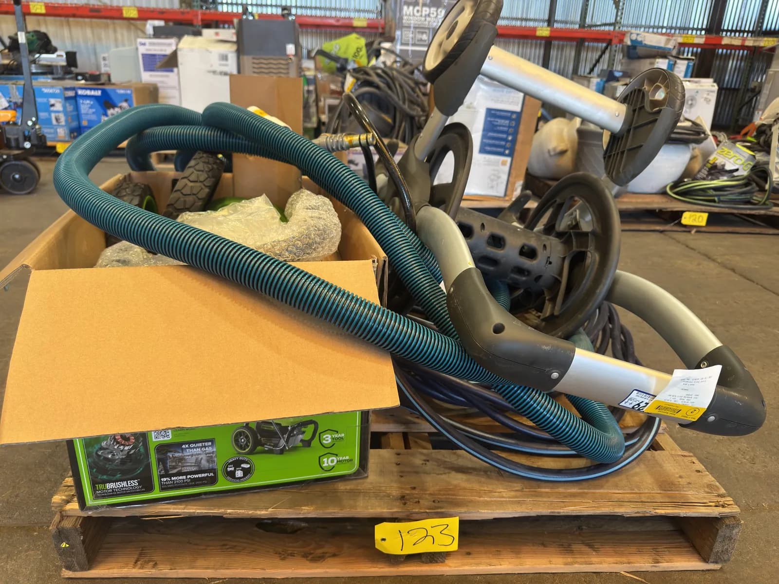 contents-of-pallet-assorted-hoses-pressure-washer-reel-and-more-mpn9heyz