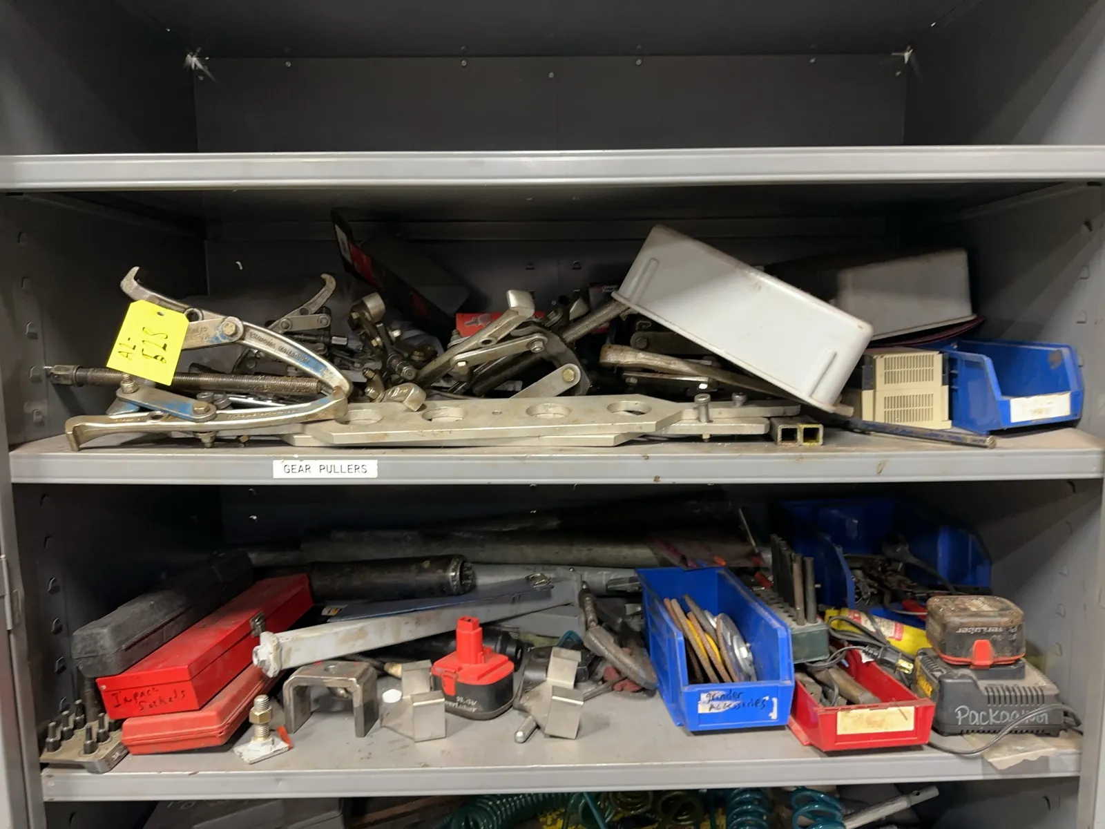 contents-of-2-shelves-assorted-drill-bits-socket-sets-grinding-discs-hand-tools-and-more-mrdq4npp