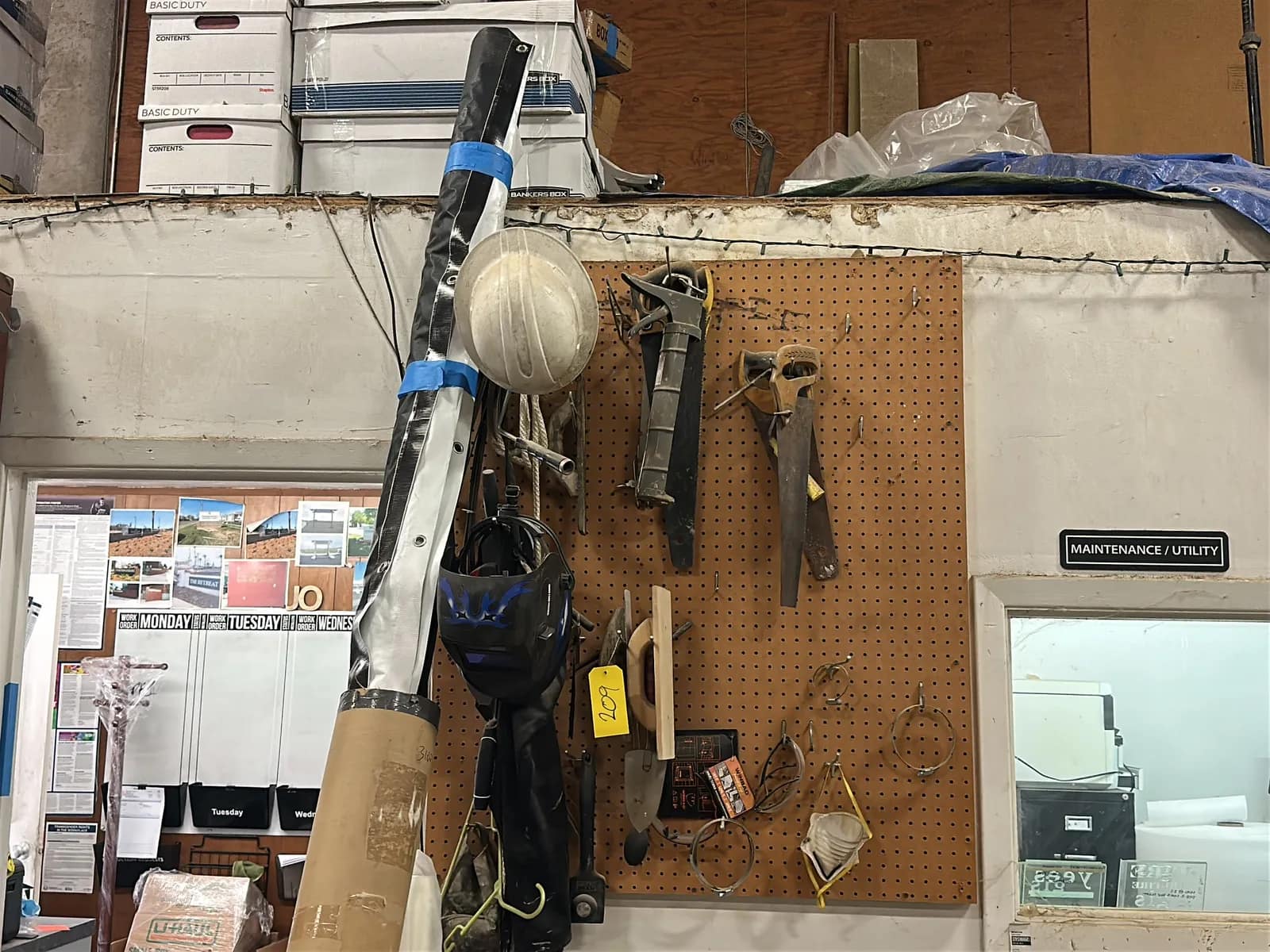 pegboard-and-contents-welding-mask-hand-saws-caulking-gun-and-more-dee363